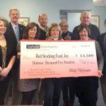 Red Stocking Fund Holding Check