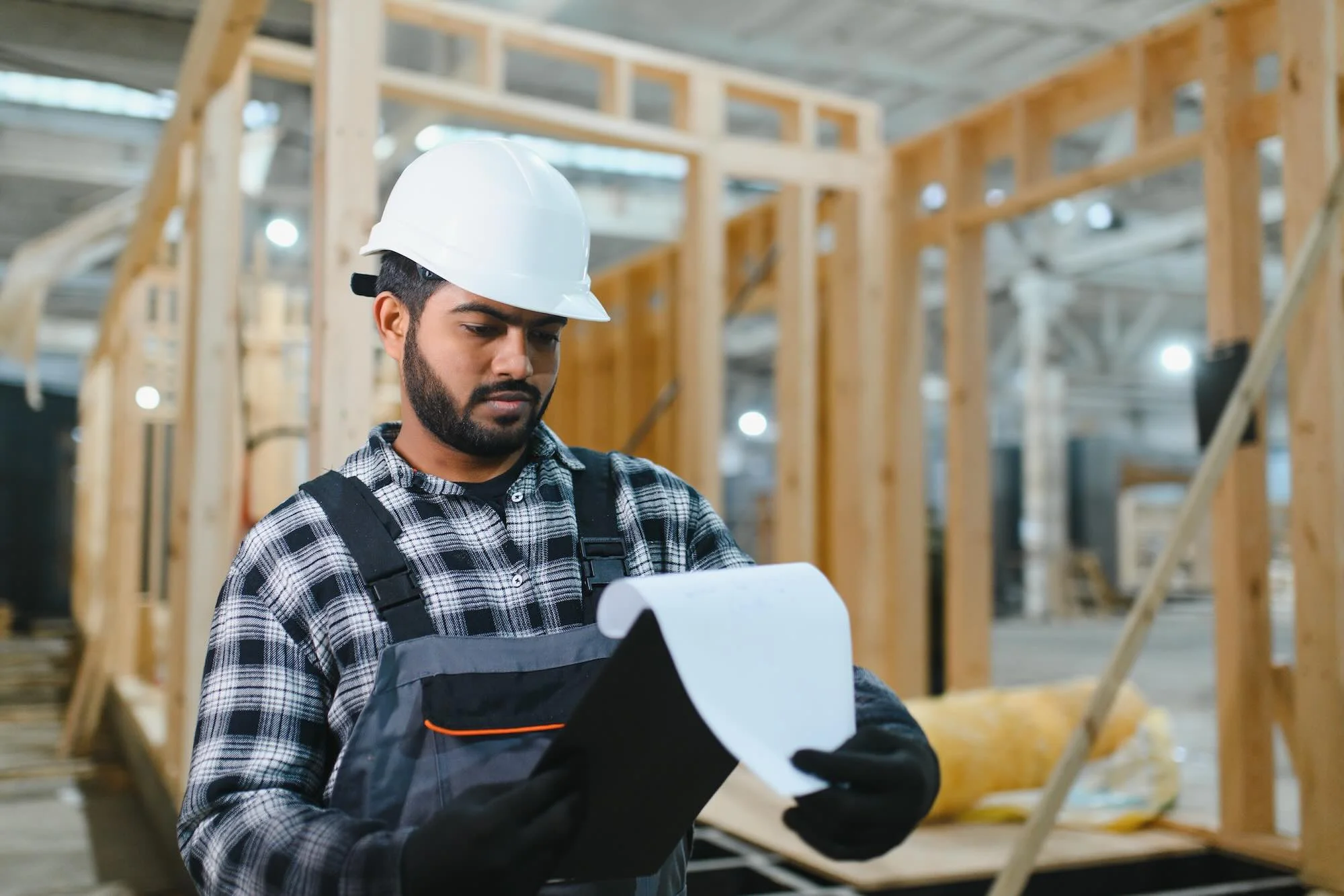 contractor reviewing bonding insurance documents