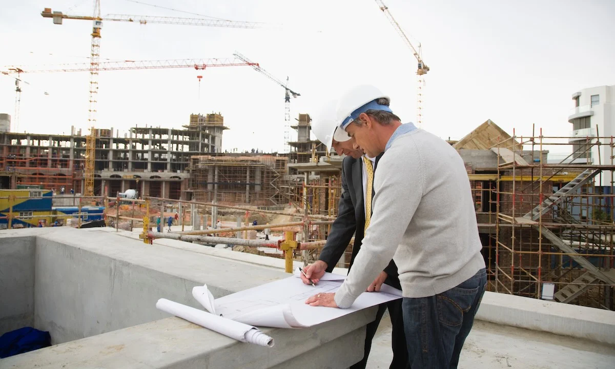 contractor reviewing construction project plans