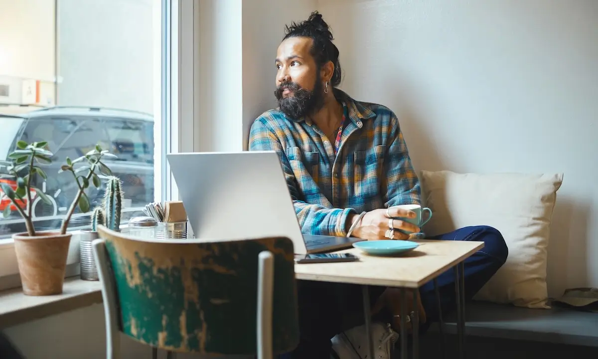 freelance consultant working laptop office