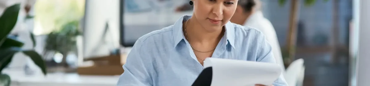 small business owner reviewing insurance costs