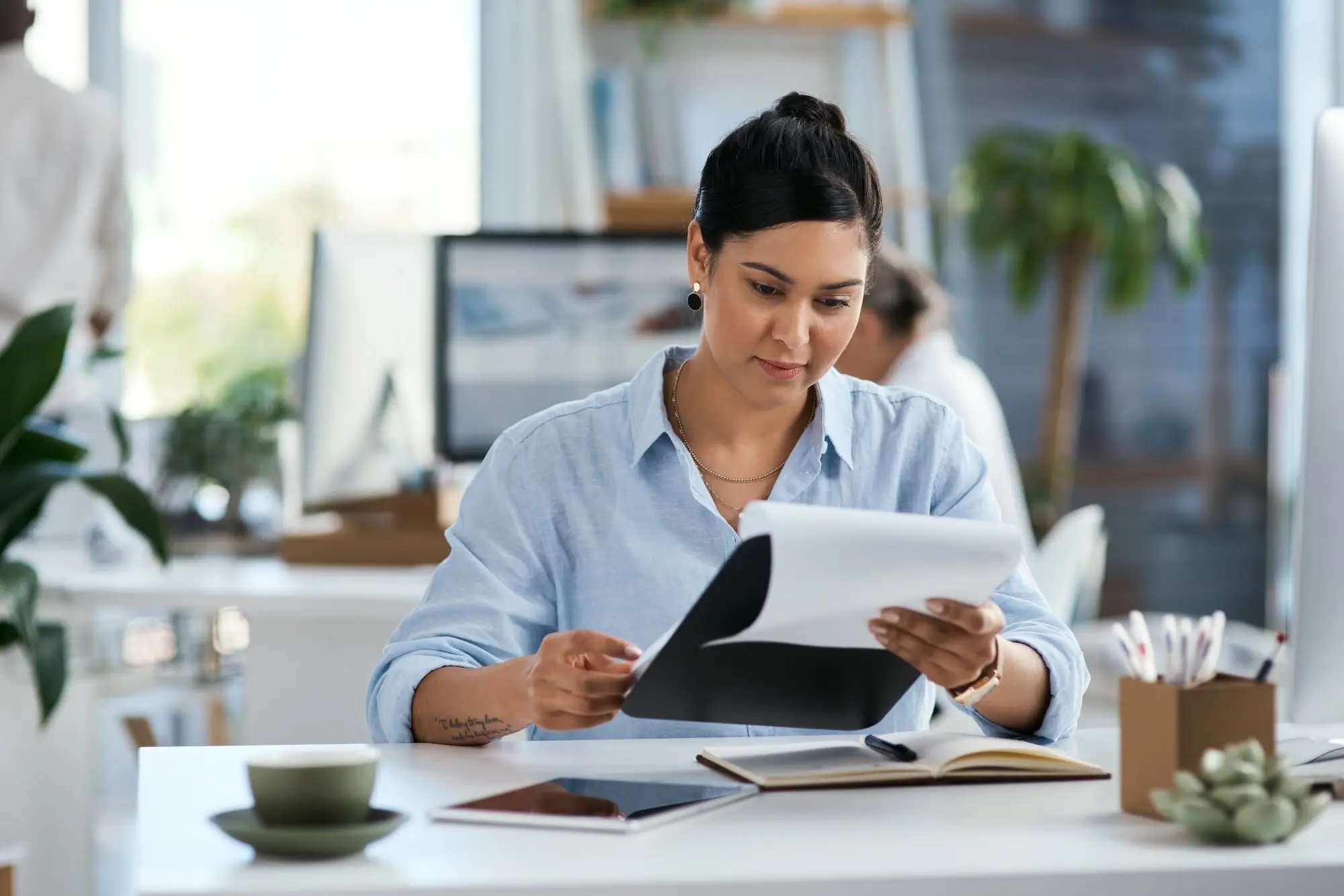 small business owner reviewing insurance costs