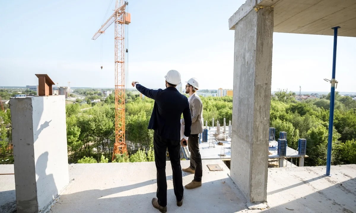 contractor overseeing construction project progress ()